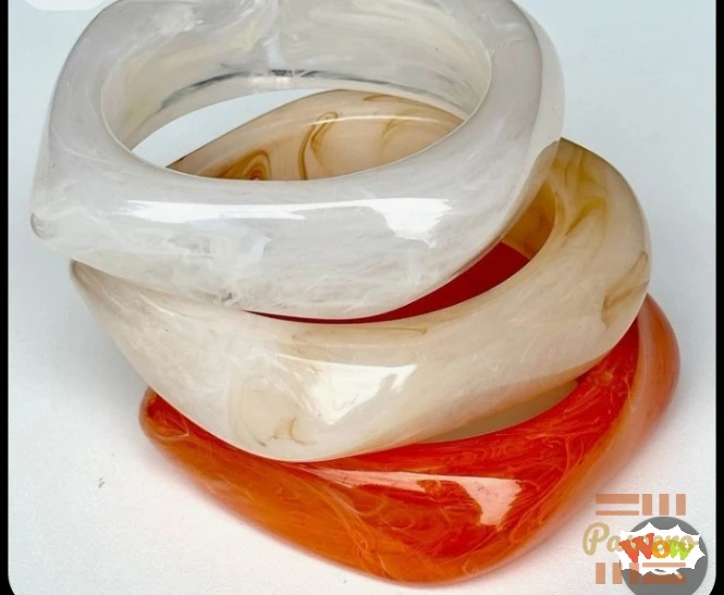 Arctic acrylic fashion bangles that standout each time you wear them .