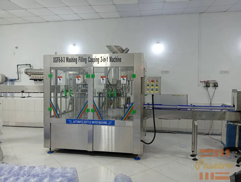 8-8-3 bottle water monoblock machine, it rinses, fills and cap the bottles1